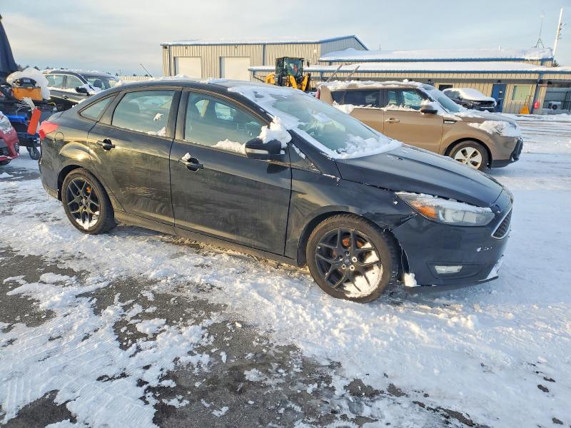 Photo 4 from auction – 2016 FORD FOCUS SE with VIN 1FADP3F24GL214267