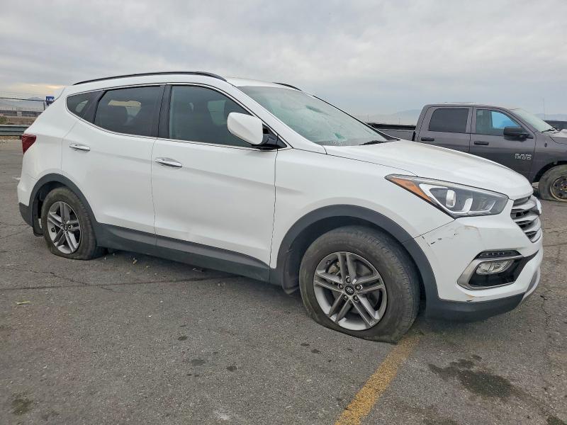 Photo 4 from auction – 2017 HYUNDAI SANTA FE SPORT with VIN 5NMZU3LB5HH041925