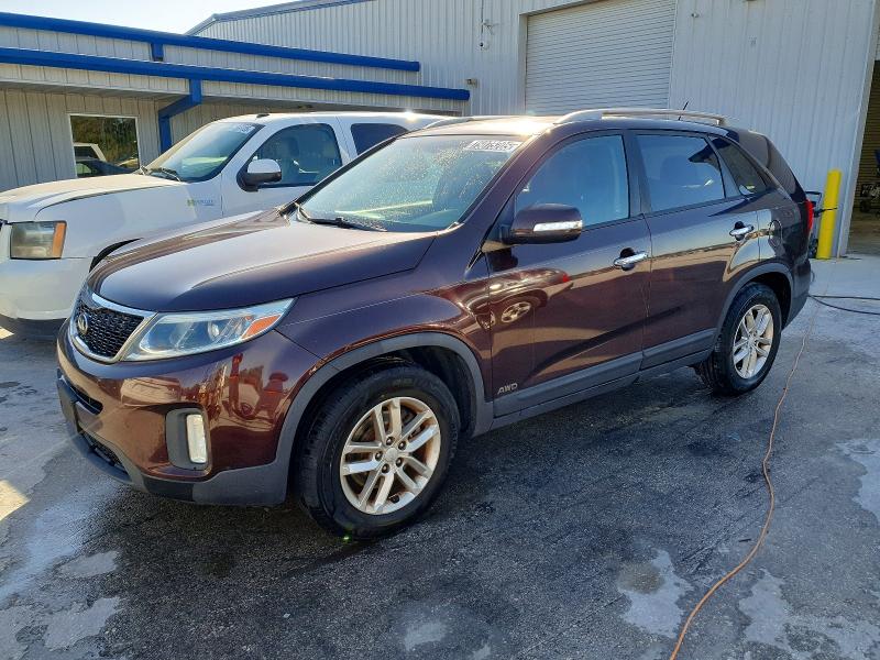 KIA SORENTO LX 2015 with VIN 5XYKTCA65FG617966 - Photo from auction