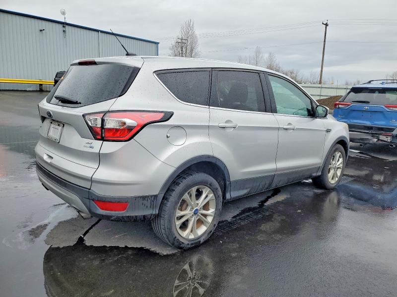 Photo 3 from auction – 2017 FORD ESCAPE SE with VIN 1FMCU9GD8HUE49859