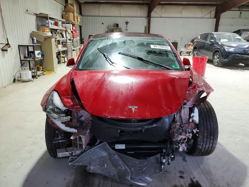Photo 5 from auction – 2018 TESLA MODEL 3 with VIN 5YJ3E1EA9JF050288