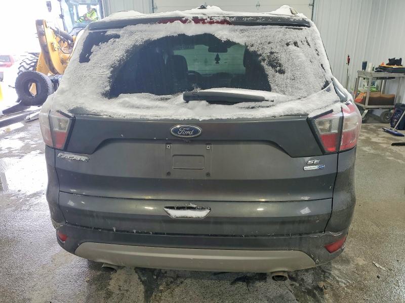 Photo 6 from auction – 2018 FORD ESCAPE with VIN 1FMCU9GD0JUB80021