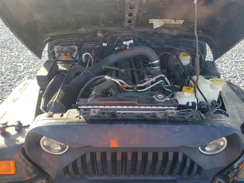 Photo 11 from auction – 2000 JEEP WRANGLER / TJ with VIN 1J4FA59S2YP800174