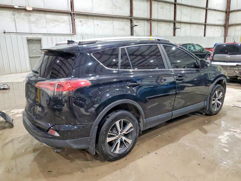 Photo 3 from auction – 2017 TOYOTA RAV4 XLE with VIN 2T3RFREV0HW651019