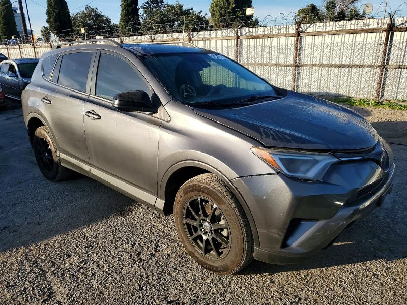Photo 4 from auction – 2018 TOYOTA RAV4 LE with VIN 2T3ZFREV6JW457245