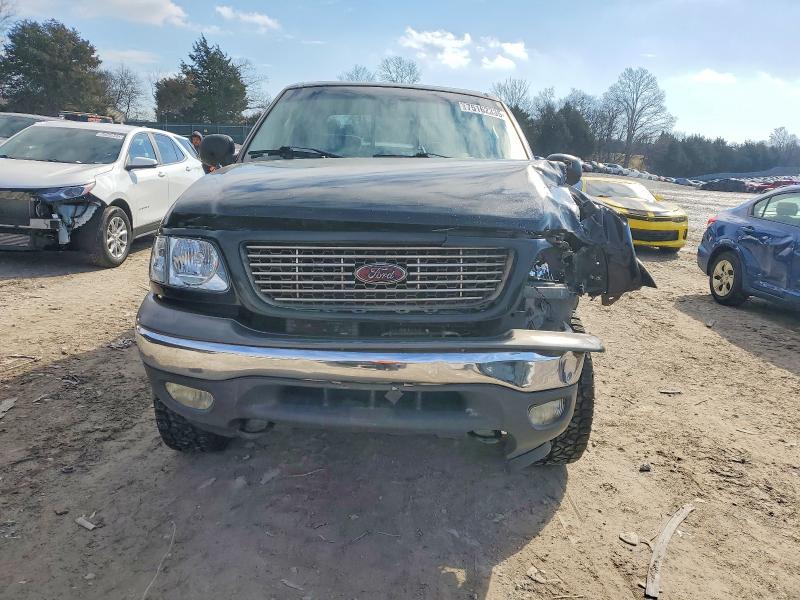 Photo 5 from auction – 2002 FORD F150 with VIN 1FTRW08L72KE25775