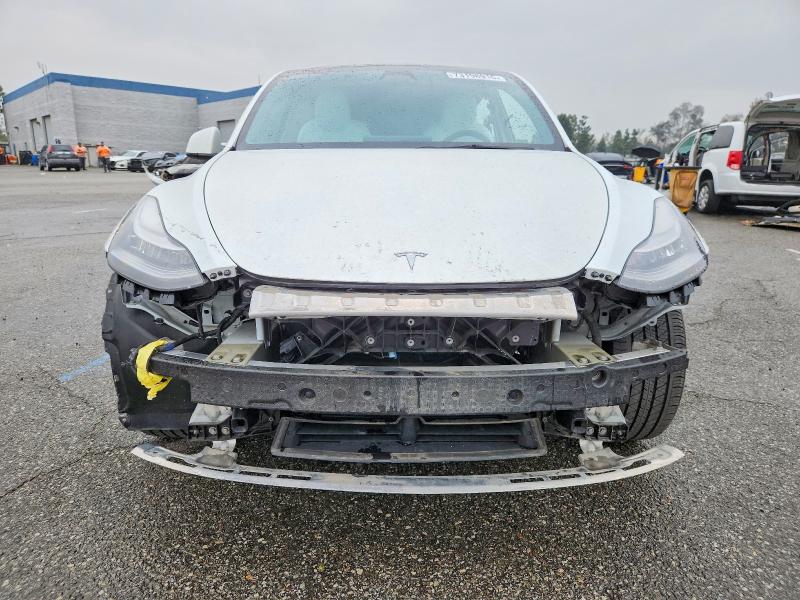 Photo 5 from auction – 2023 TESLA MODEL Y with VIN 7SAYGDEE5PF583271