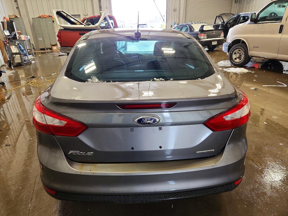Фото 6 с аукциона – 2014 FORD FOCUS S с VIN 1FADP3E25EL131493