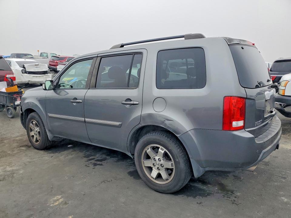 Photo 2 from auction – 2010 HONDA PILOT TOUR with VIN 5FNYF3H95AB018454