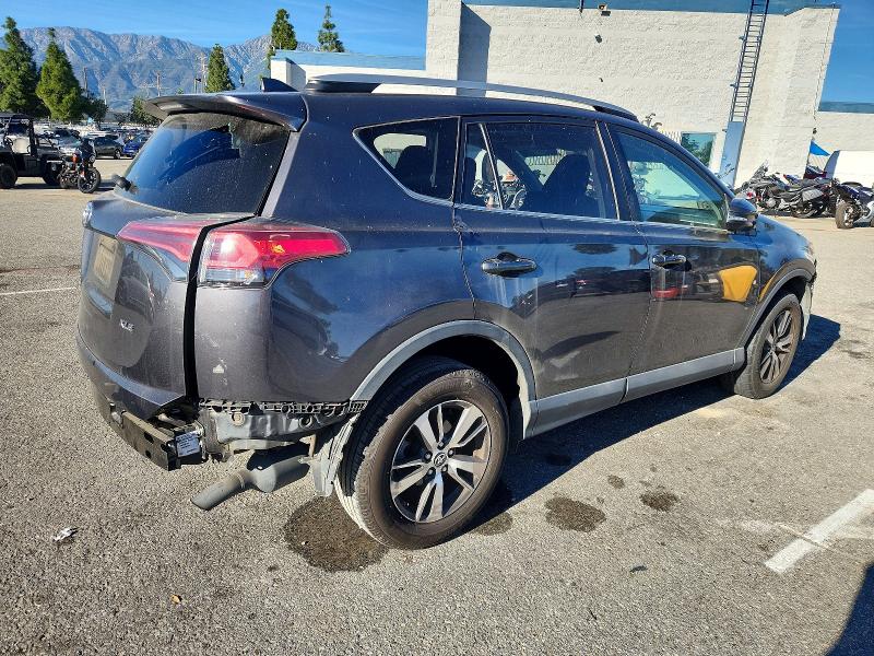 Photo 3 from auction – 2016 TOYOTA RAV4 XLE with VIN 2T3WFREV6GW235512