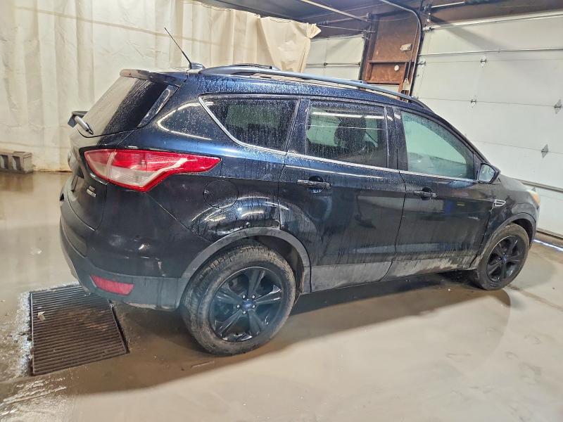 Photo 3 from auction – 2016 FORD ESCAPE SE with VIN 1FMCU9GX9GUB03179