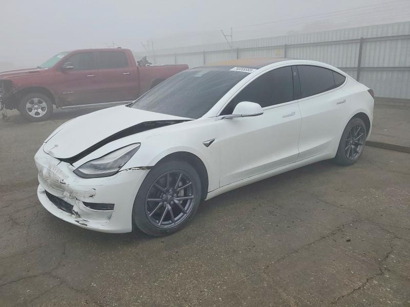 TESLA MODEL 3 2018 with VIN 5YJ3E1EA4JF162223 - Photo from auction