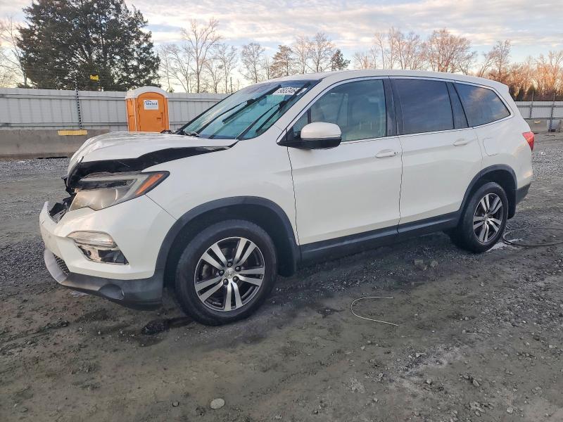 HONDA PILOT EXL 2016 with VIN 5FNYF6H50GB029742 - Photo from auction