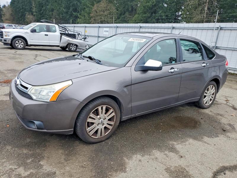 FORD FOCUS SEL 2011 with VIN 1FAHP3HN9BW181900 - Photo from auction