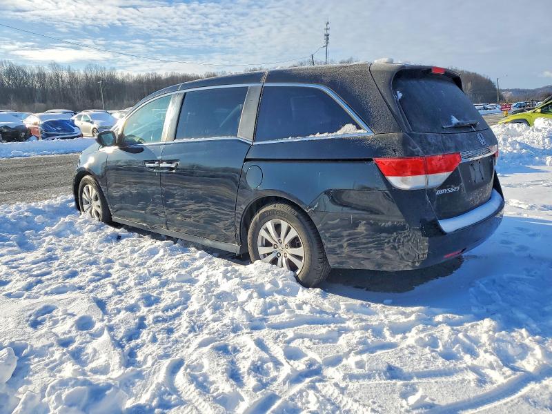 Photo 2 from auction – 2016 HONDA ODYSSEY with VIN 5FNRL5H66GB081425