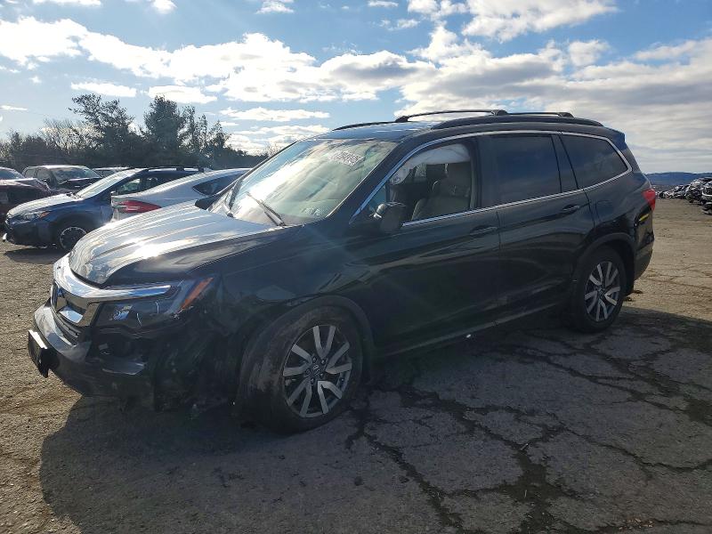 HONDA PILOT EXL 2021 with VIN 5FNYF6H51MB004540 - Photo from auction