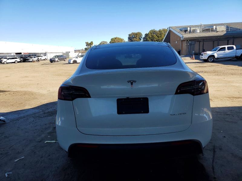 Photo 6 from auction – 2023 TESLA MODEL Y with VIN 7SAYGDEE2PF635696