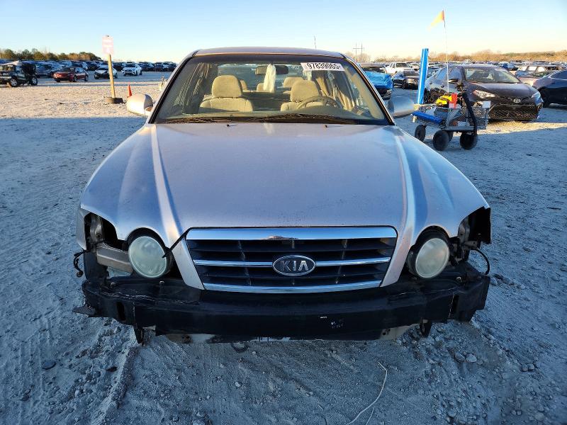 Photo 5 from auction – 2004 KIA OPTIMA LX with VIN KNAGD126145363357