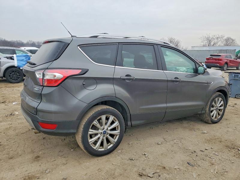 Photo 3 from auction – 2017 FORD ESCAPE TIT with VIN 1FMCU9J98HUB64695