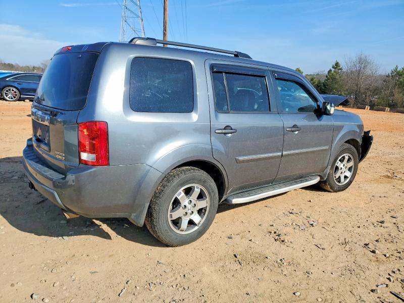 Фото 3 с аукциона – 2011 HONDA PILOT TOUR с VIN 5FNYF4H97BB101844