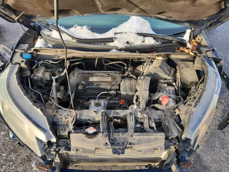 Photo 11 from auction – 2015 HONDA CR-V LX with VIN 2HKRM4H33FH606258
