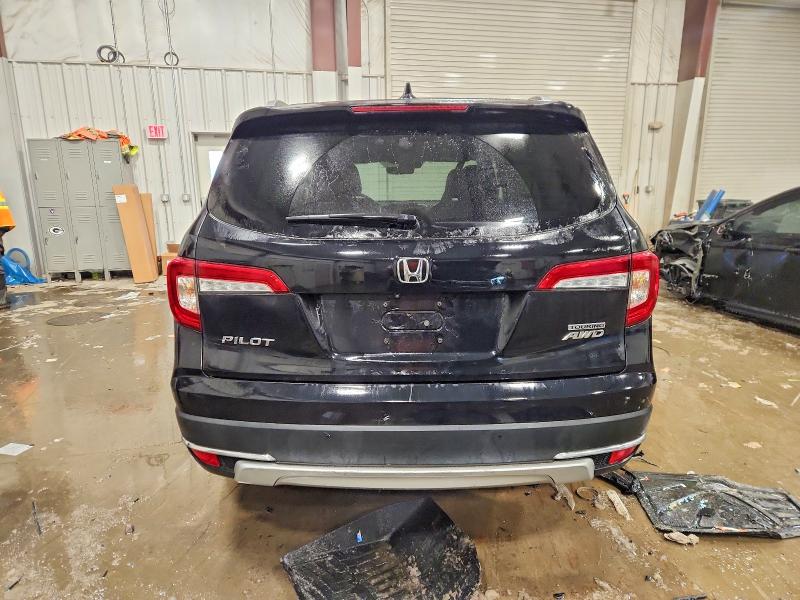 Photo 6 from auction – 2021 HONDA PILOT TOUR with VIN 5FNYF6H99MB064469