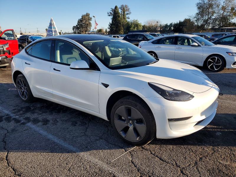 Photo 4 from auction – 2022 TESLA MODEL 3 with VIN 5YJ3E1EA9NF113637