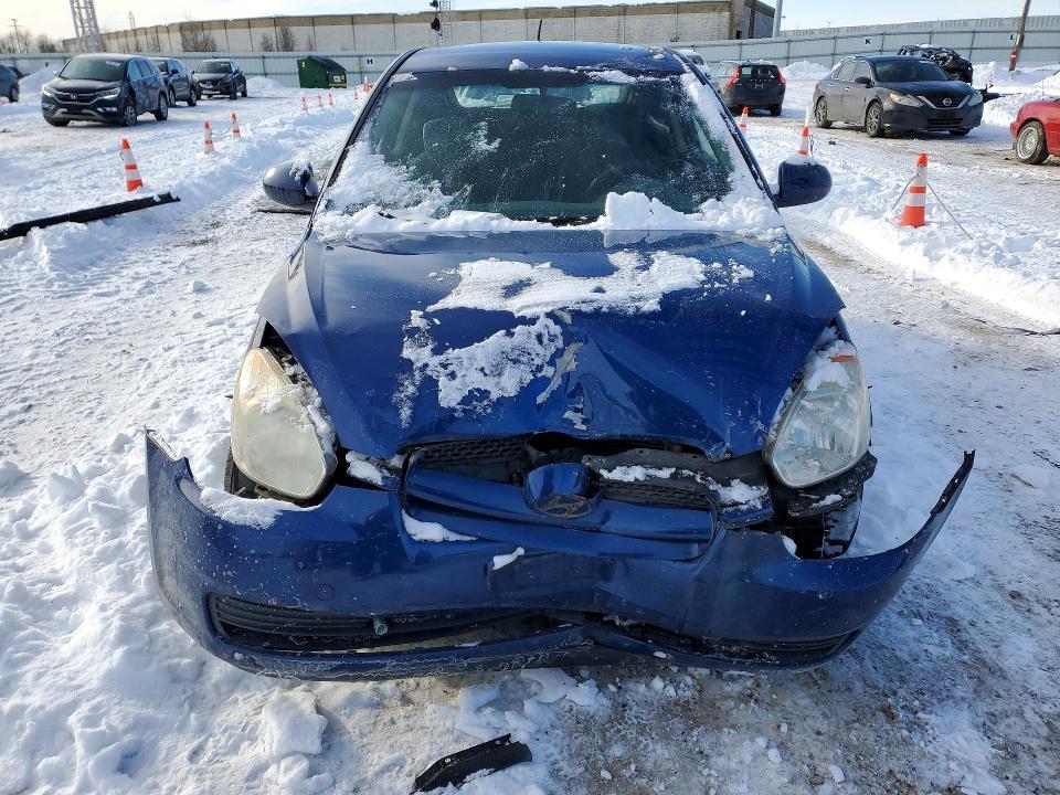 Photo 5 from auction – 2010 HYUNDAI ACCENT BLU with VIN KMHCM3AC8AU180975