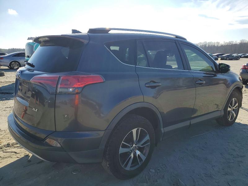 Photo 3 from auction – 2017 TOYOTA RAV4 XLE with VIN JTMWFREV2HJ131471