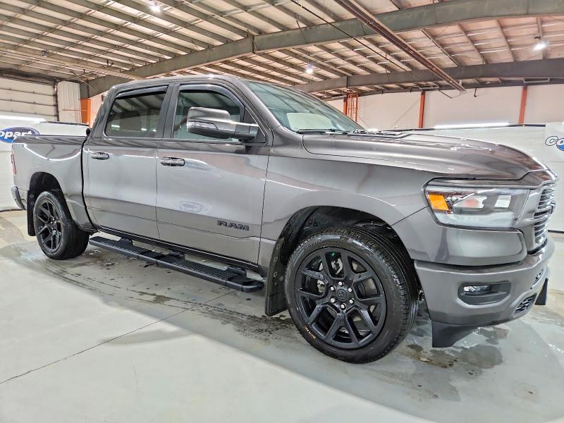 Photo 4 from auction – 2023 RAM 1500 SPORT with VIN 1C6SRFVTXPN690350