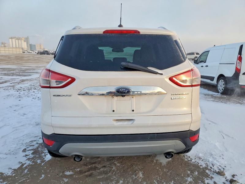Photo 6 from auction – 2016 FORD ESCAPE TIT with VIN 1FMCU0J99GUC86234