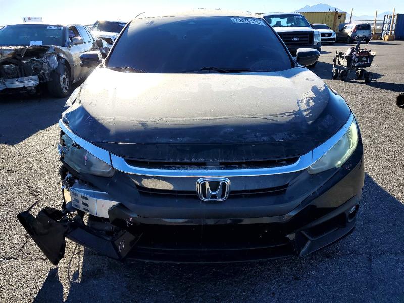 Photo 5 from auction – 2016 HONDA CIVIC with VIN 2HGFC1F49GH640930