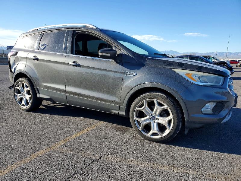 Photo 4 from auction – 2017 FORD ESCAPE TIT with VIN 1FMCU0JD2HUE09250
