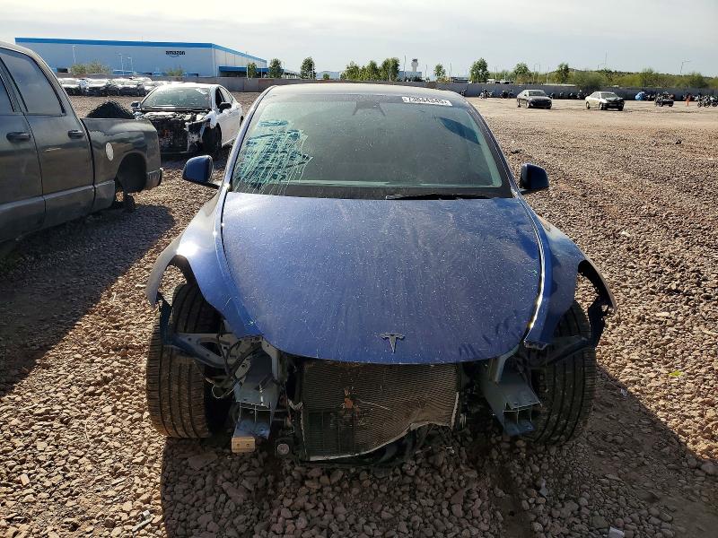 Photo 5 from auction – 2023 TESLA MODEL Y with VIN 7SAYGAEE2PF624826