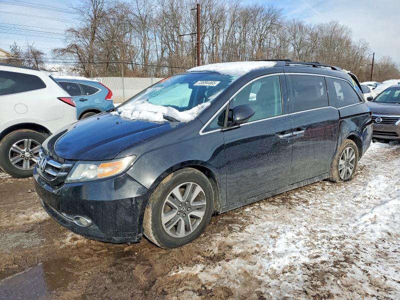HONDA ODYSSEY TO 2014 with VIN 5FNRL5H94EB086372 - Photo from auction