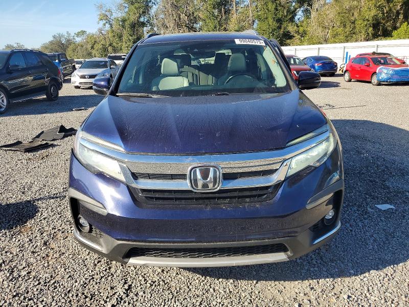 Photo 5 from auction – 2022 HONDA PILOT ELIT with VIN 5FNYF6H09NB029076