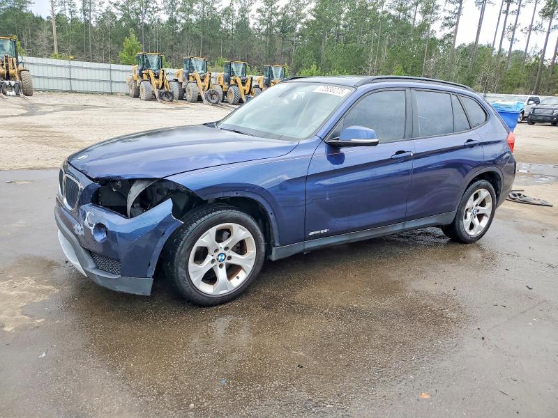 BMW X1 SDRIVE2 2014 with VIN WBAVM1C59EVW49049 - Photo from auction