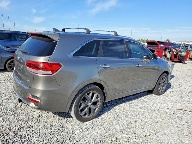 Photo 3 from auction – 2016 KIA SORENTO with VIN 5XYPK4A57GG118139