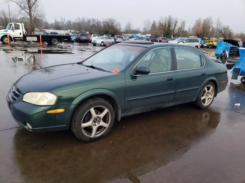 NISSAN MAXIMA GLE 2000 with VIN JN1CA31A4YT006643 - Photo from auction
