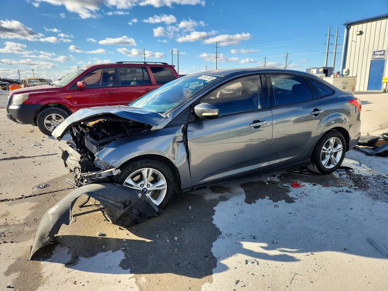 FORD FOCUS 2014 with VIN 1FADP3F21EL317675 - Photo from auction