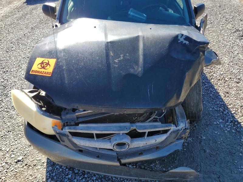 Photo 12 from auction – 2003 MAZDA TRIBUTE LX with VIN 4F2YZ04153KM52014