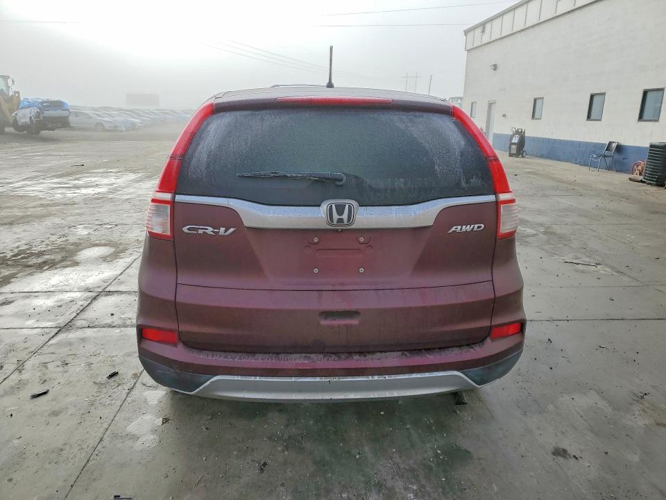 Photo 6 from auction – 2015 HONDA CR-V EX with VIN 2HKRM4H58FH625213