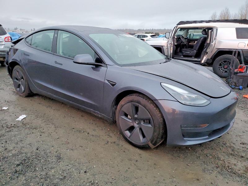 Photo 4 from auction – 2023 TESLA MODEL 3 with VIN 5YJ3E1EA1PF697874