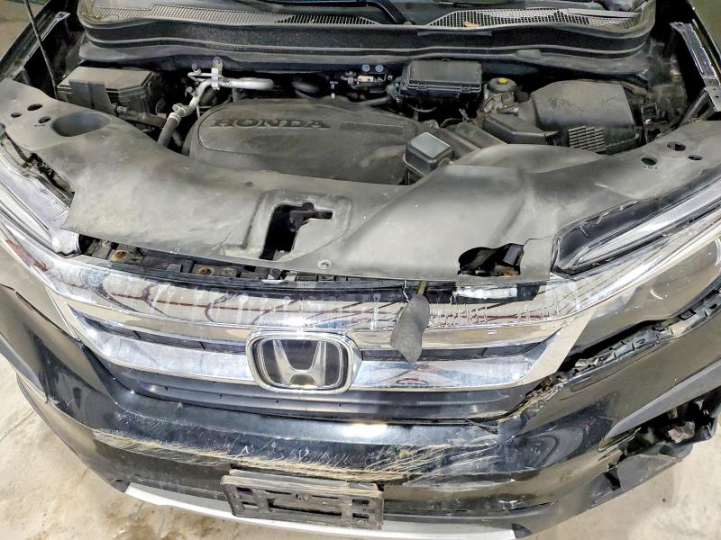 Photo 12 from auction – 2021 HONDA PILOT with VIN 5FNYF6H56MB069819