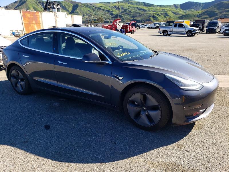 Photo 4 from auction – 2018 TESLA MODEL 3 with VIN 5YJ3E1EA5JF036677