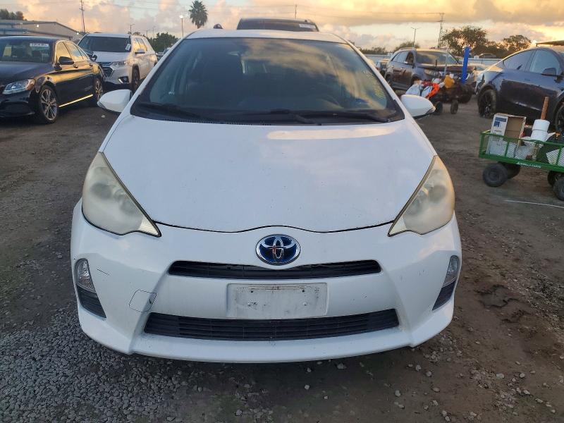 Photo 5 from auction – 2013 TOYOTA PRIUS C with VIN JTDKDTB30D1546836