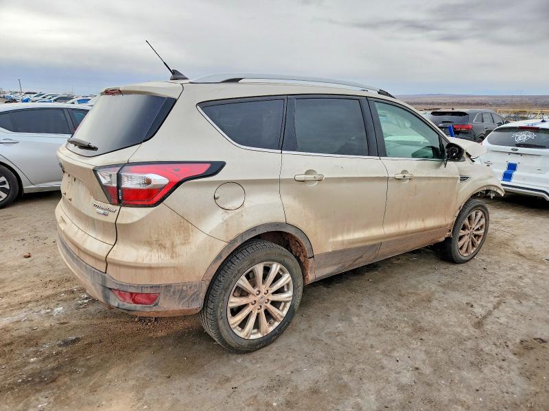 Photo 3 from auction – 2018 FORD ESCAPE with VIN 1FMCU9J96JUD56235