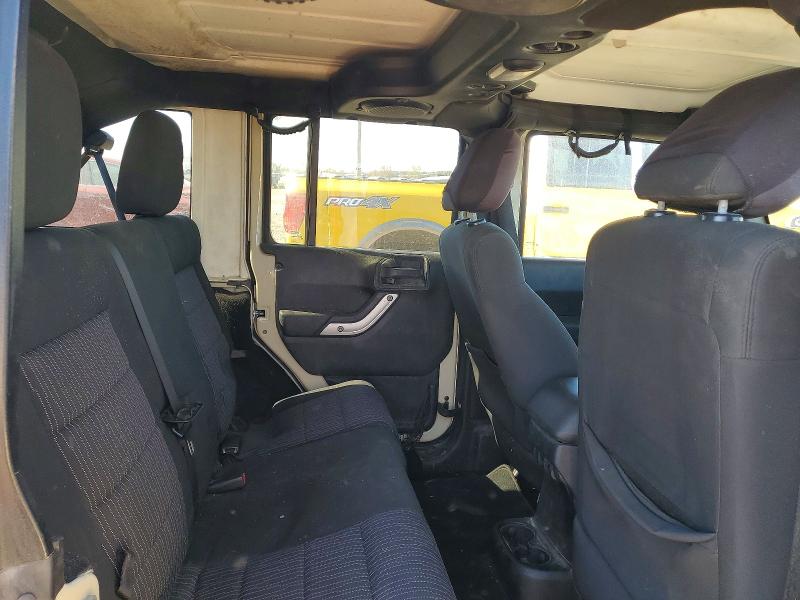 Photo 10 from auction – 2011 JEEP WRANGLER U with VIN 1J4BA5H13BL571042