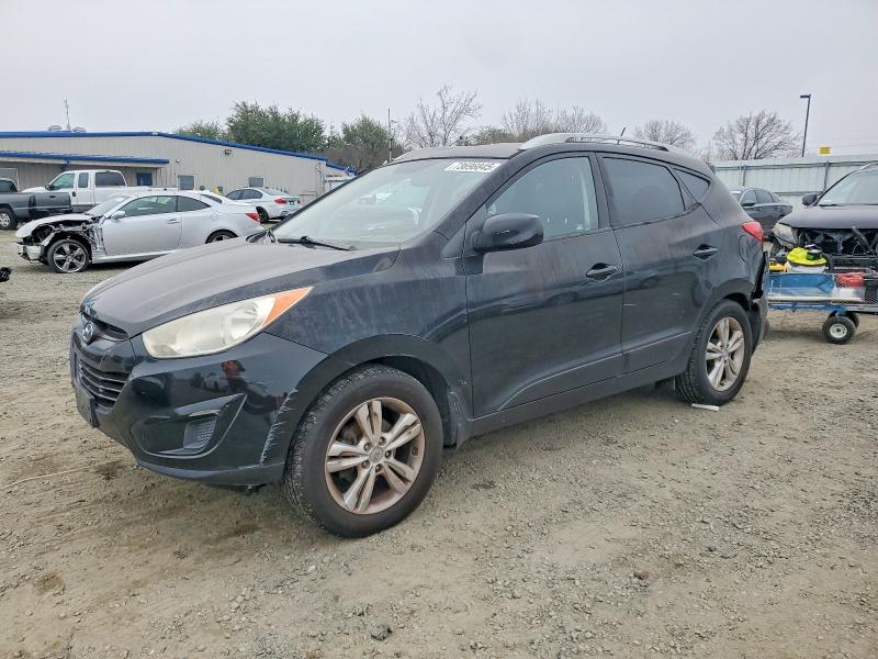 HYUNDAI TUCSON 2011 with VIN KM8JU3AC5BU257116 - Photo from auction