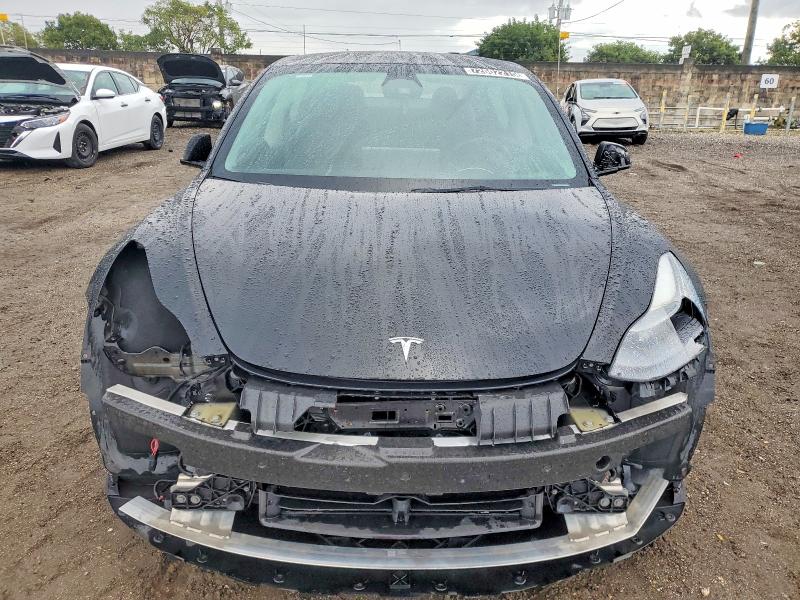 Photo 5 from auction – 2022 TESLA MODEL 3 with VIN 5YJ3E1EAXNF369267